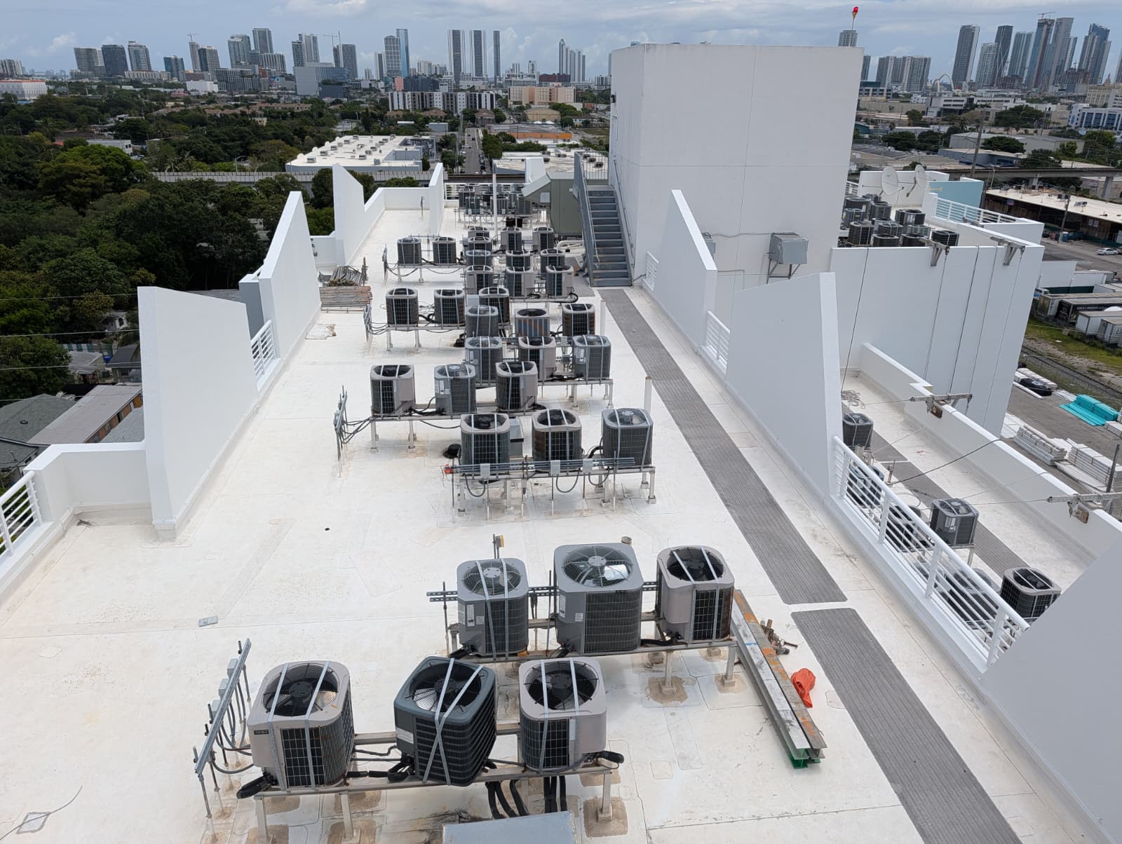 Authentic client high-rise concrete equipment deck with protective multi-coat floor surfacing