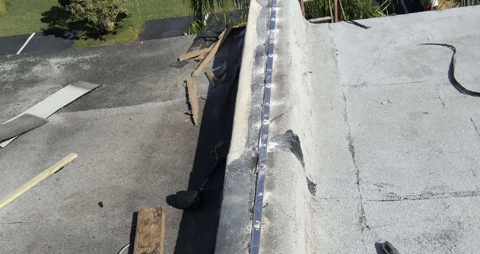 Authentic client concrete parapet wall and retaining edge termination repair