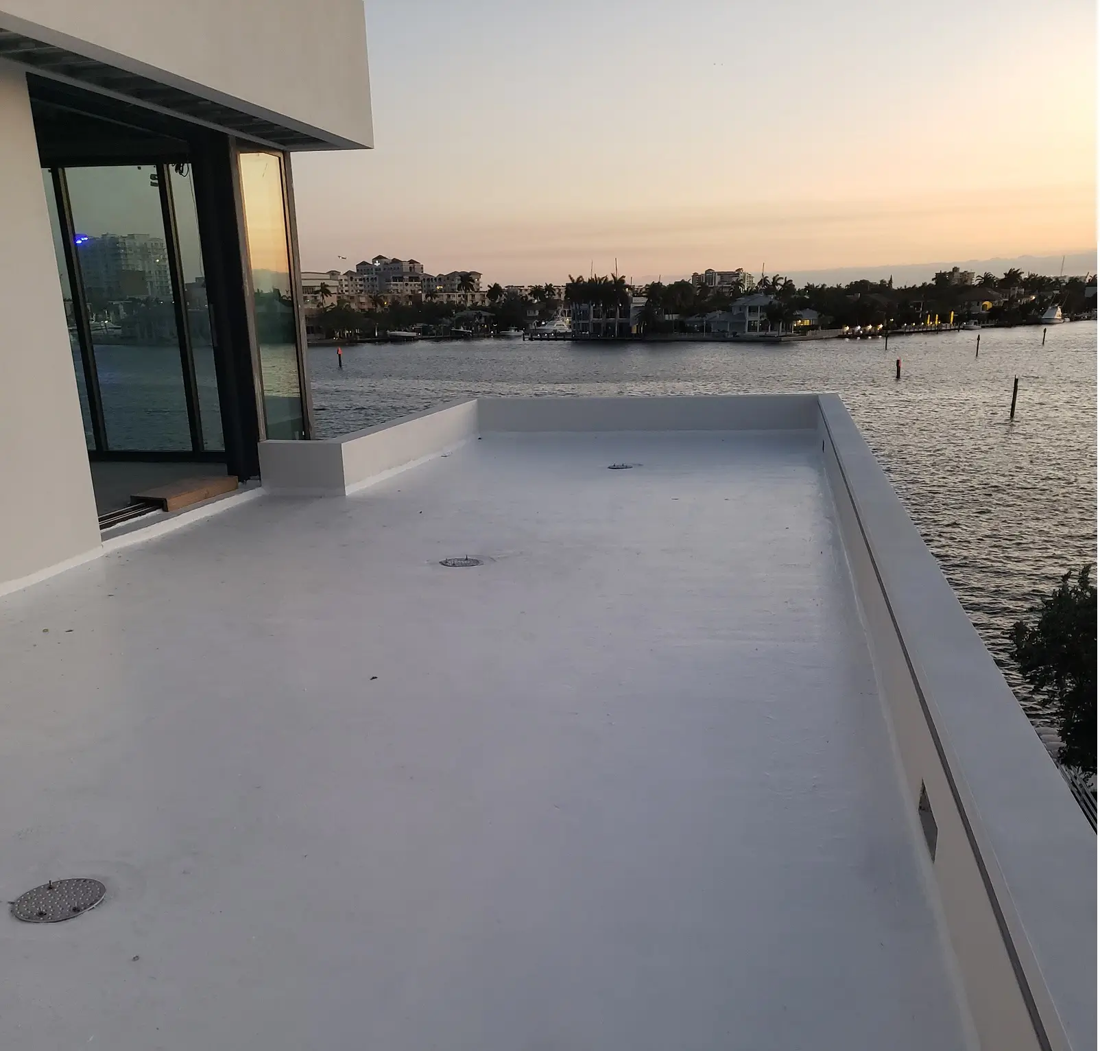 Authentic completed waterproof deck coating on waterfront elevated concrete slab